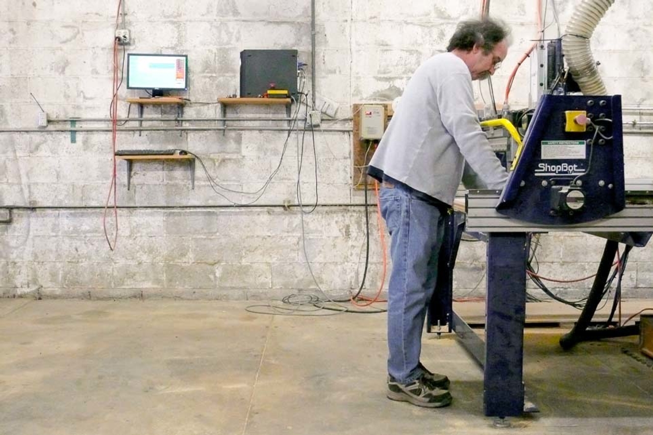 Bill Young in his workshop with a Shopbot